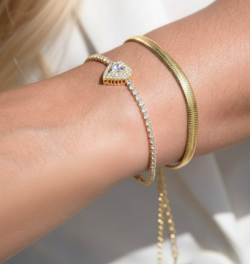 Pulseira Riviera com Coracao Cravejado Banhada em Ouro 18k. image 1