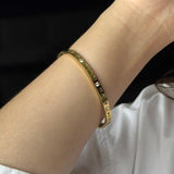 Bracelete em Romanos e Cristais